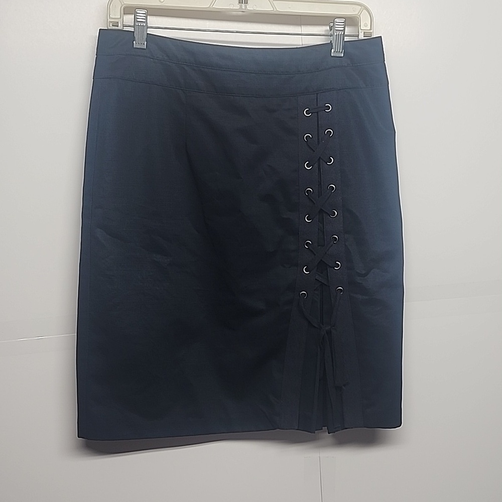 Nanette lepore size 6, dark blue lined, tie down the front pleated skirt.